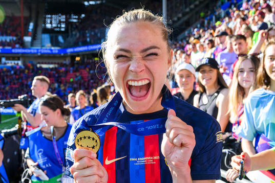Fridolina Rolfö of Barcelona celebrates with her gold medal