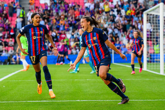 Patri Guijarro of Barcelona celebrates scoring 2-2