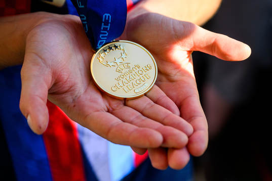 Fridolina Rolfö of Barcelona holds up her gold medal