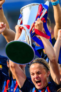 Irene Paredes of Barcelona lifts the trophy