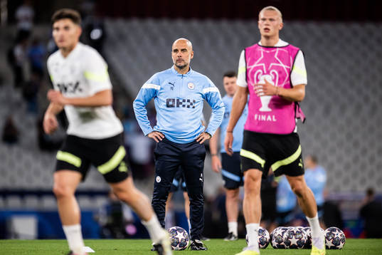 Pep Guardiola, head coach and Erling Braut Haaland of