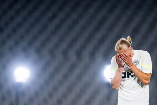Erling Braut Haaland of Manchester City looks dejected at a