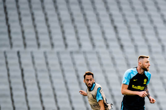 Hakan Calhanoglu and Milan Skriniar of Inter at a training