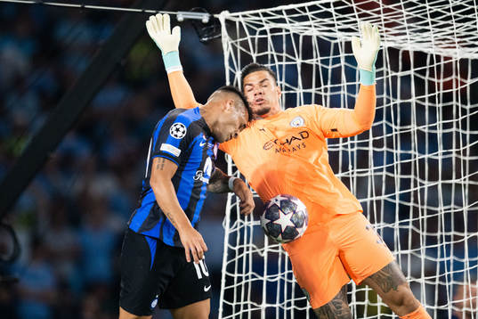 Lautaro Martinez of Inter and goalkeeper Ederson of