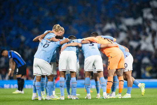 Players of Manchester City gather