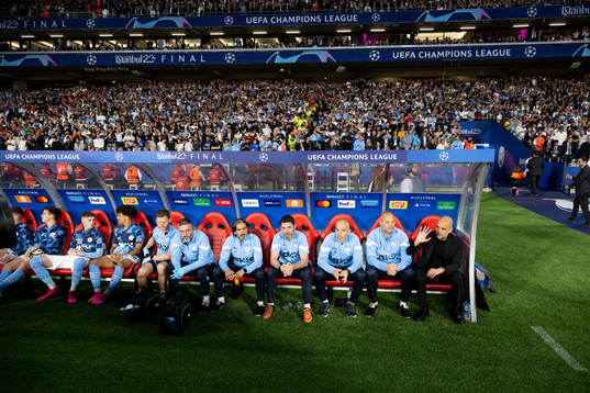 Head coach Pep Guardiola of Manchester City with staff