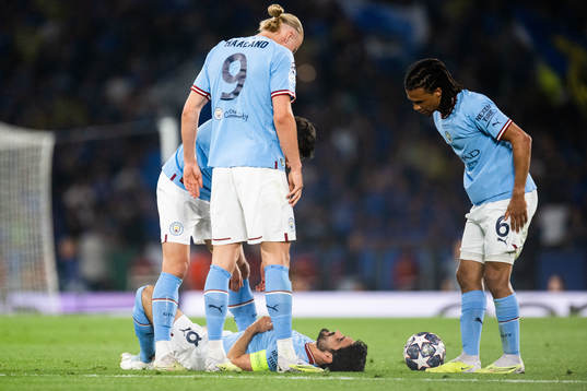 Ilkay Gundogan, Erling Braut Haaland and Nathan Ake of