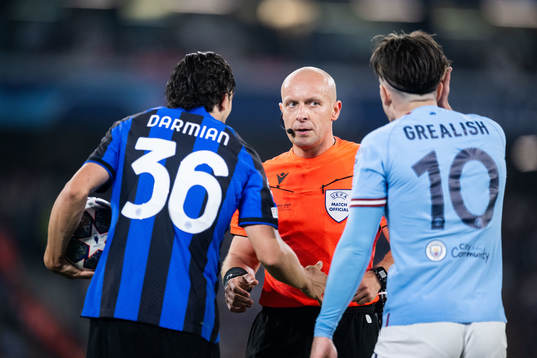 Referee Szymon Marciniak