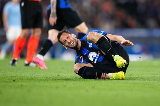 Hakan Calhanoglu of Inter in pain