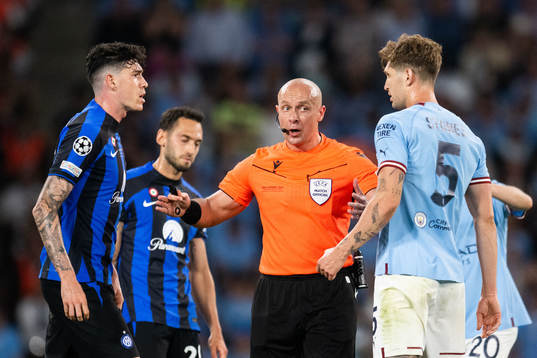 Alessandro Bastoni of Inter, Referee Szymon Marciniak and.