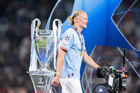 Erling Braut Haaland of Manchester City and the trophy