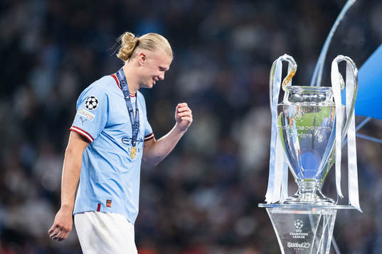 Erling Braut Haaland of Manchester City and the trophy