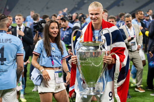 Erling Braut Haaland of Manchester City and the trophy
