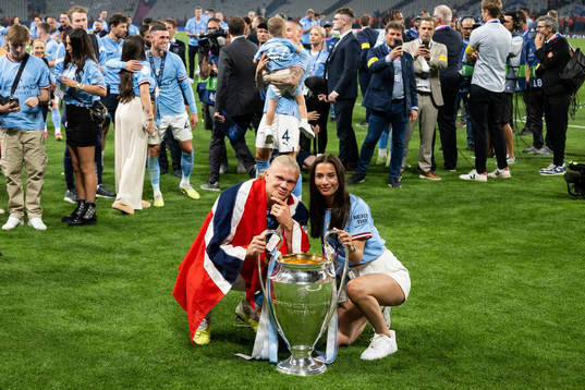 Erling Braut Haaland of Manchester City and the trophy