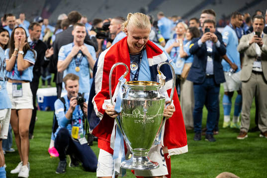 Erling Braut Haaland of Manchester City and the trophy