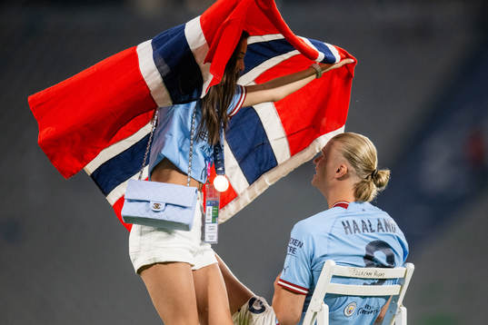 Erling Braut Haaland of Manchester City and Isabel Haugseng