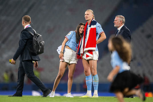 Erling Braut Haaland of Manchester City and Isabel Haugseng