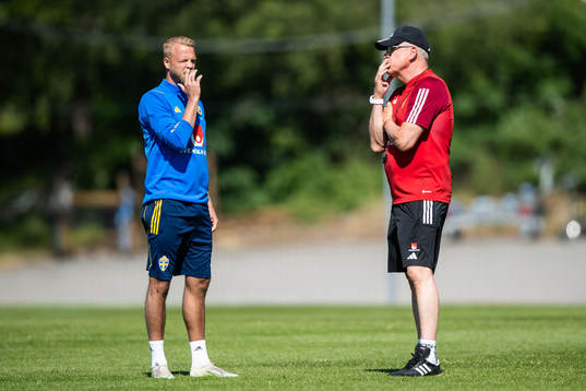 Daniel Sundgren and head coach Janne Andersson of the