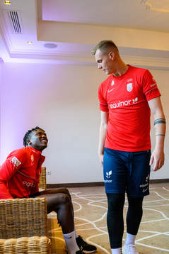 Seedy Jatta and goalkeeper Kristoffer Klaesson of the