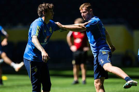 Victor Nilsson Lindelöf and Dejan Kulusevski of the