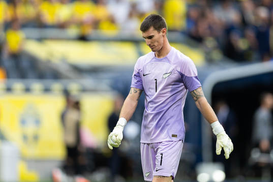 Goalkeeper Oli Sail of New Zealand looks dejected