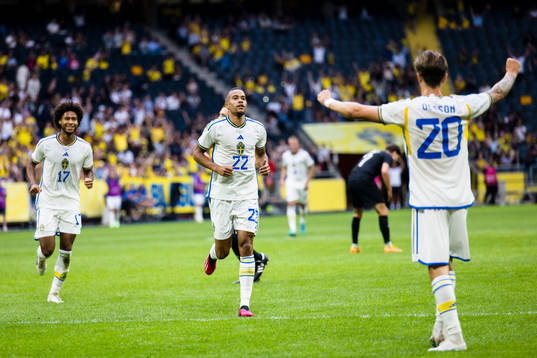Robin Quaison of Sweden celebrate with teammates