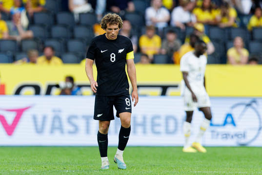 Joe Bell of New Zealand looks dejected