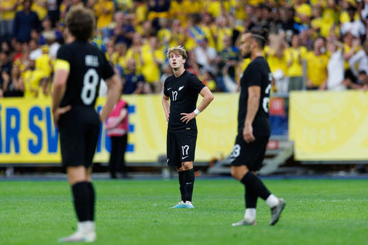 Alex Greive of New Zealand looks dejected