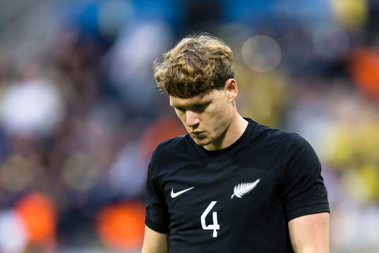 Nando Pijnaker of New Zealand looks dejected