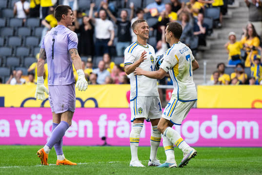 Jesper Karlsson and Viktor Claesson of Sweden celebrate