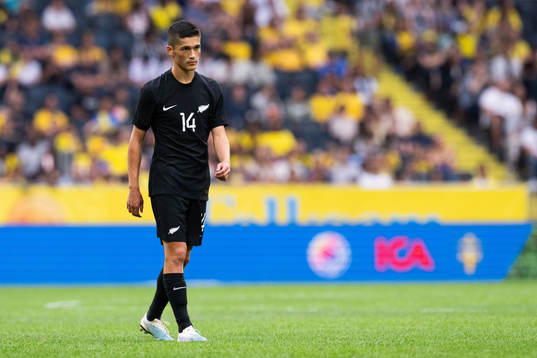 Elijah Just of New Zealand looks dejected