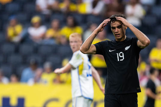 Max Mata of New Zealand looks dejected