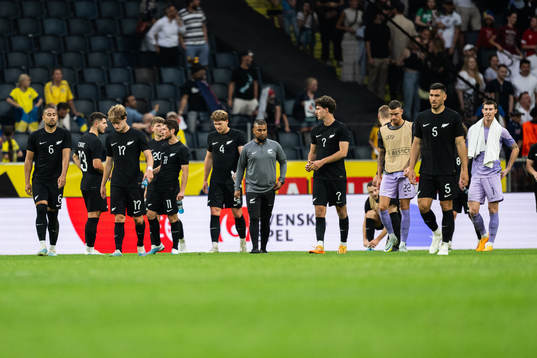 Players of of New Zealand look dejected