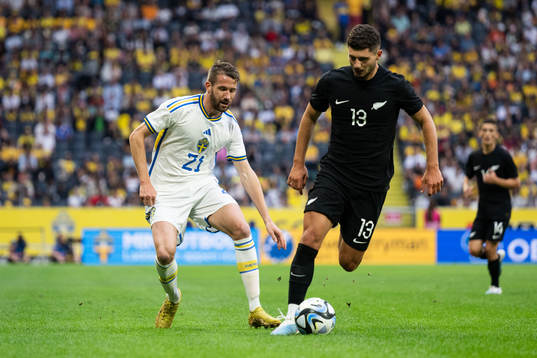 Marcus Rohdén of Sweden and Liberato Cacace of New Zealand