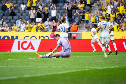Goalkeeper Oli Sail of New Zealand looks dejected