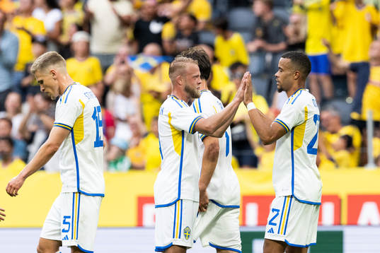 Robin Quaison of Sweden celebrates with Daniel Sundgren