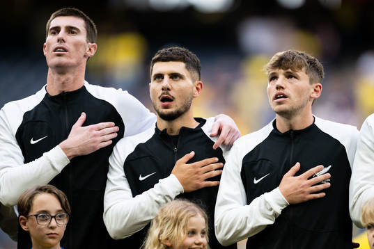 Goalkeeper Oli Sail, Liberato Cacace and Callum Mccowatt of