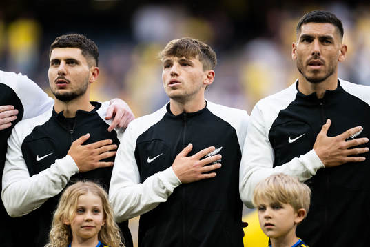 Liberato Cacace, Callum Mccowatt and Michael Boxall of New