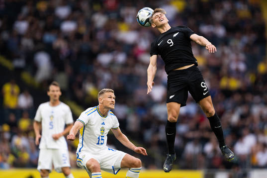 Carl Starfelt of Sweden and Ben Waine of New Zealand