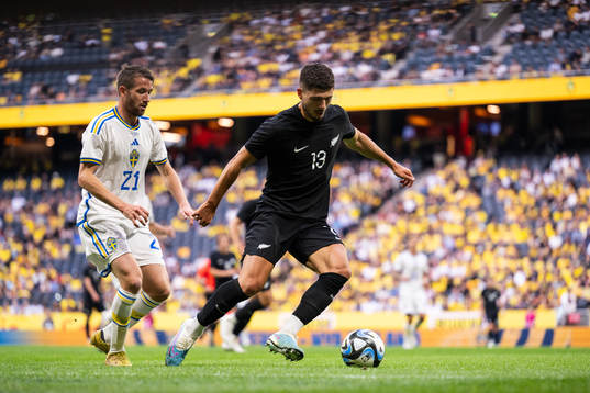 Marcus Rohdén of Sweden and Liberato Cacace of New Zealand