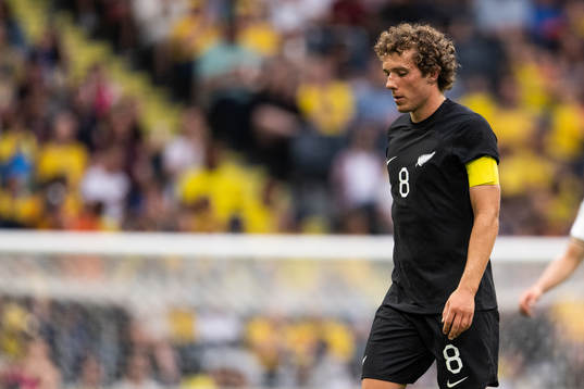 Joe Bell of New Zealand looks dejected