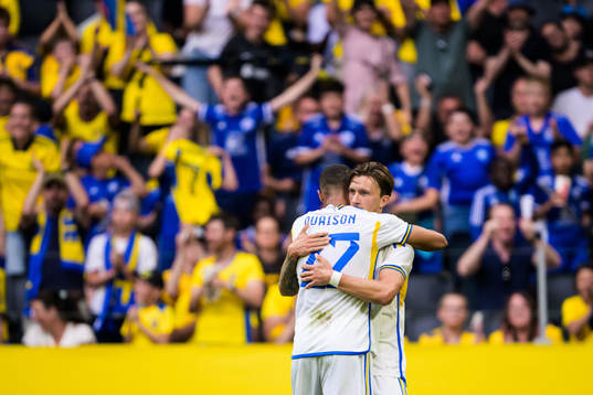 Robin Quaison and Kristoffer Olsson of Sweden celebrate the