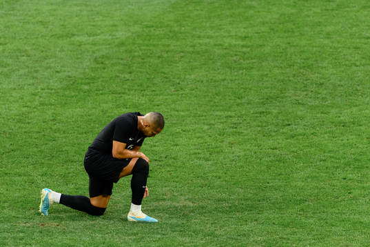 George Saville of Northern Ireland looks dejected