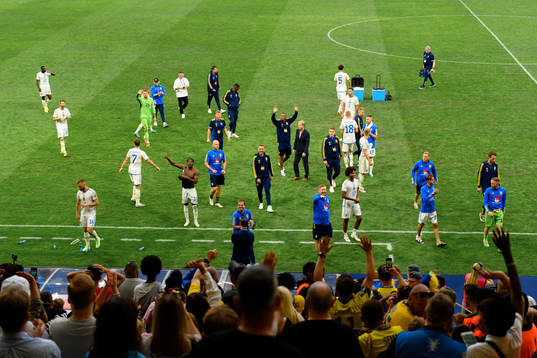 The Swedish players celebrate
