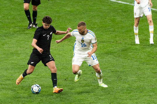 Matt Garbett of New Zealand and Jesper Karlström of Sweden