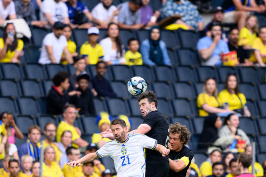 Marcus Rohdén of Sweden against Tim Payne and Joe Bell of