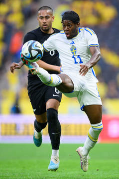 Bill Tuiloma of New Zealand and Anthony Elanga of Sweden