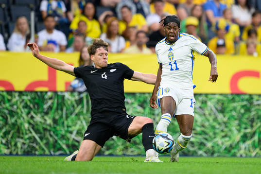 Trai Hume of Northern Ireland and Anthony Elanga of Sweden