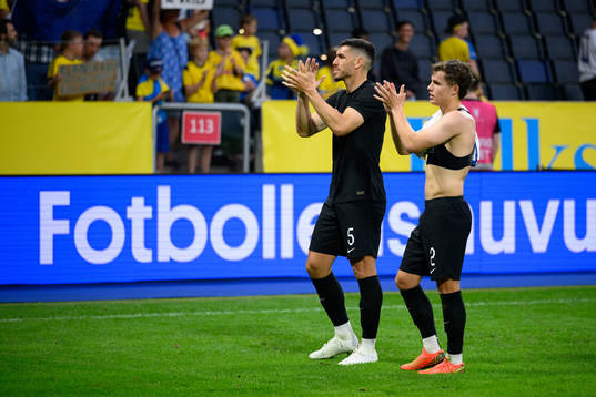 Michael Boxall and Callan Elliot look dejected