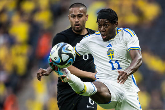 Bill Tuiloma of New Zealand and Anthony Elanga of Sweden